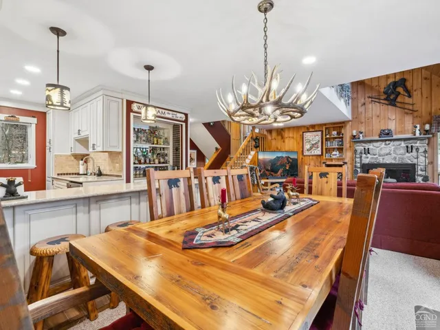 a view of a livingroom with furniture and window