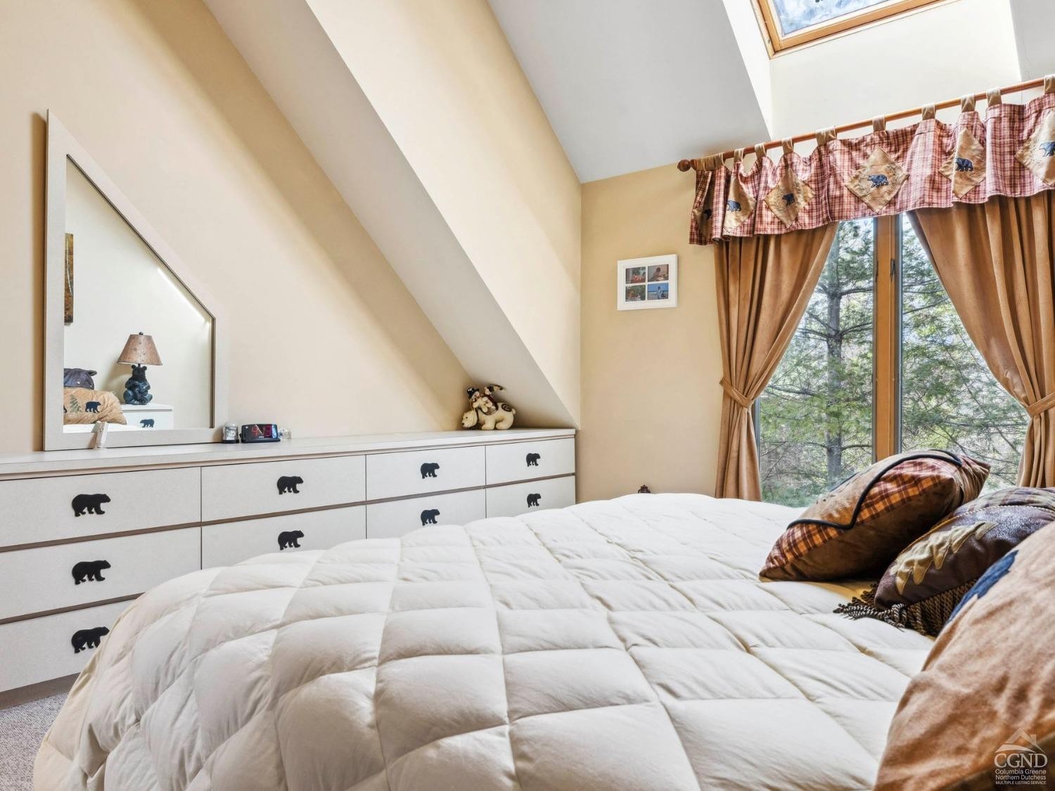 57 Brainard Ridge Road, Unit 3E Windham, NY 12496 - Photo 35 of 55 a bedroom with a bed and a window