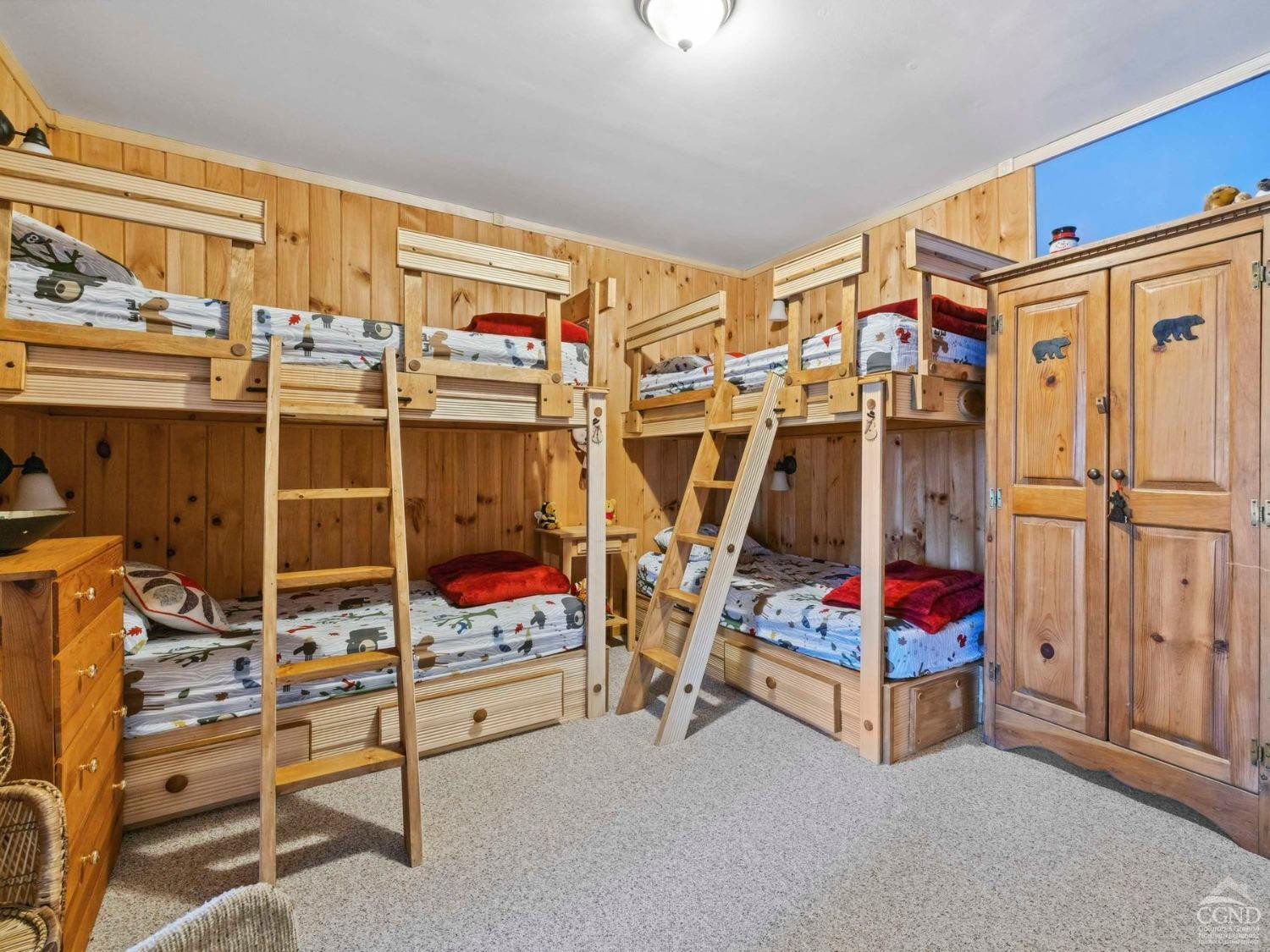 57 Brainard Ridge Road, Unit 3E Windham, NY 12496 - Photo 41 of 55 a bedroom with bunk bed and a window