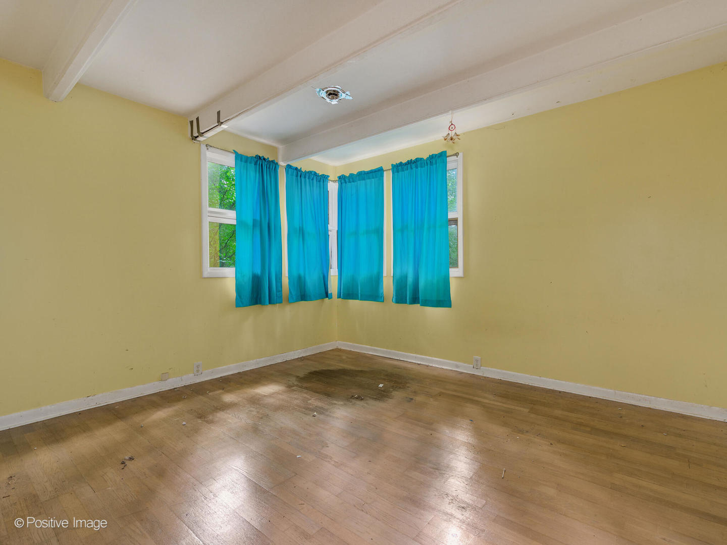 1360 West Everett Road Lake Forest, IL 60045 - Photo 12 of 14 a view of an empty room with wooden floor and a window