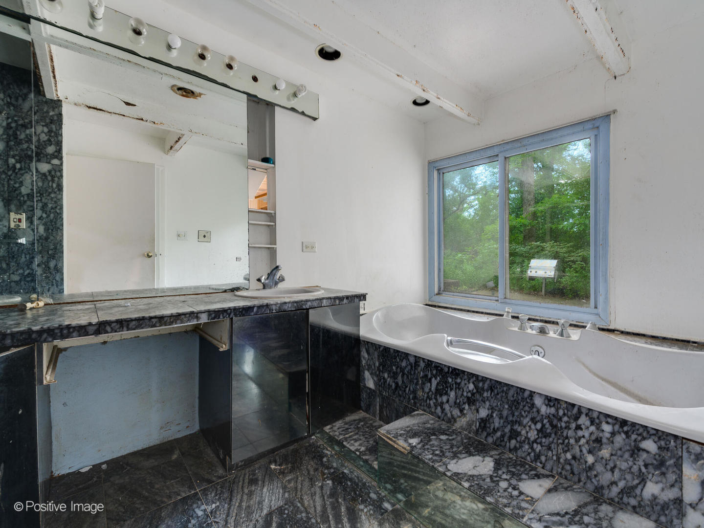 1360 West Everett Road Lake Forest, IL 60045 - Photo 13 of 14 a bathroom with a sink and a mirror