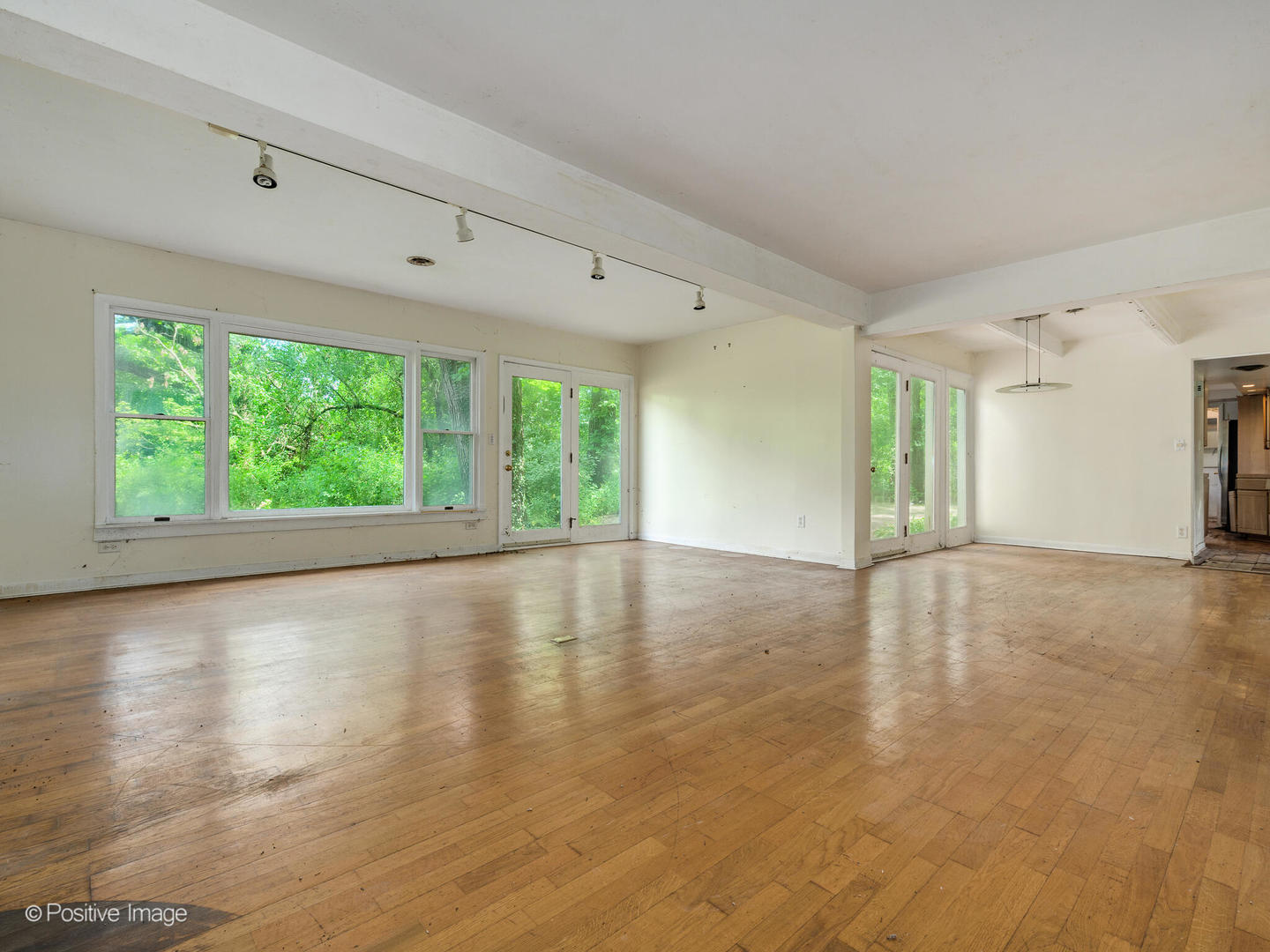 1360 West Everett Road Lake Forest, IL 60045 - Photo 7 of 14 a view of empty room with wooden floor and fan