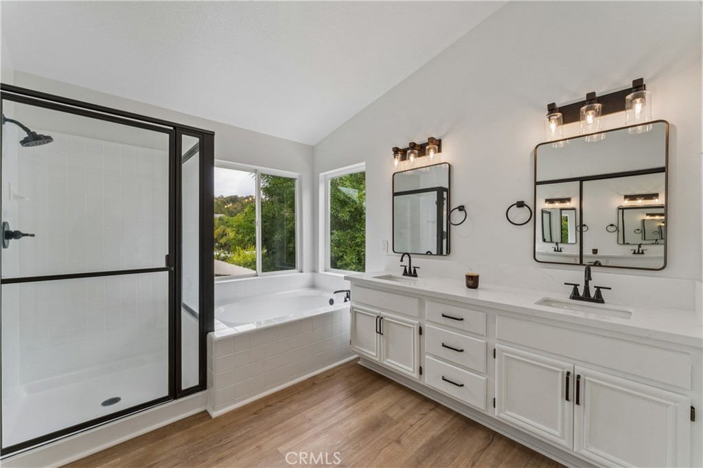 26023 Salinger Lane Stevenson Ranch, CA 91381 - Photo 16 of 35 Stunning, renovated primary bathroom featuring modern finishes and premium fixtures.