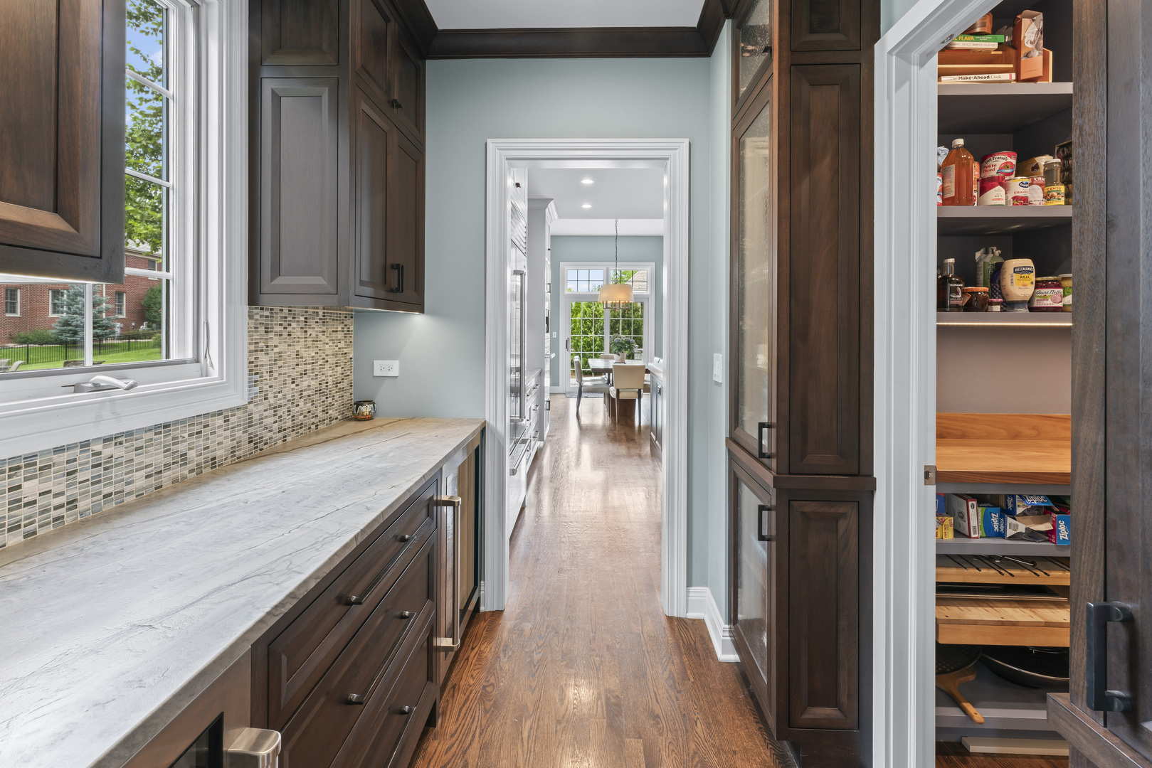 1546 Midway Lane Glenview, IL 60026 - Photo 16 of 46 a view of a kitchen from the hallway