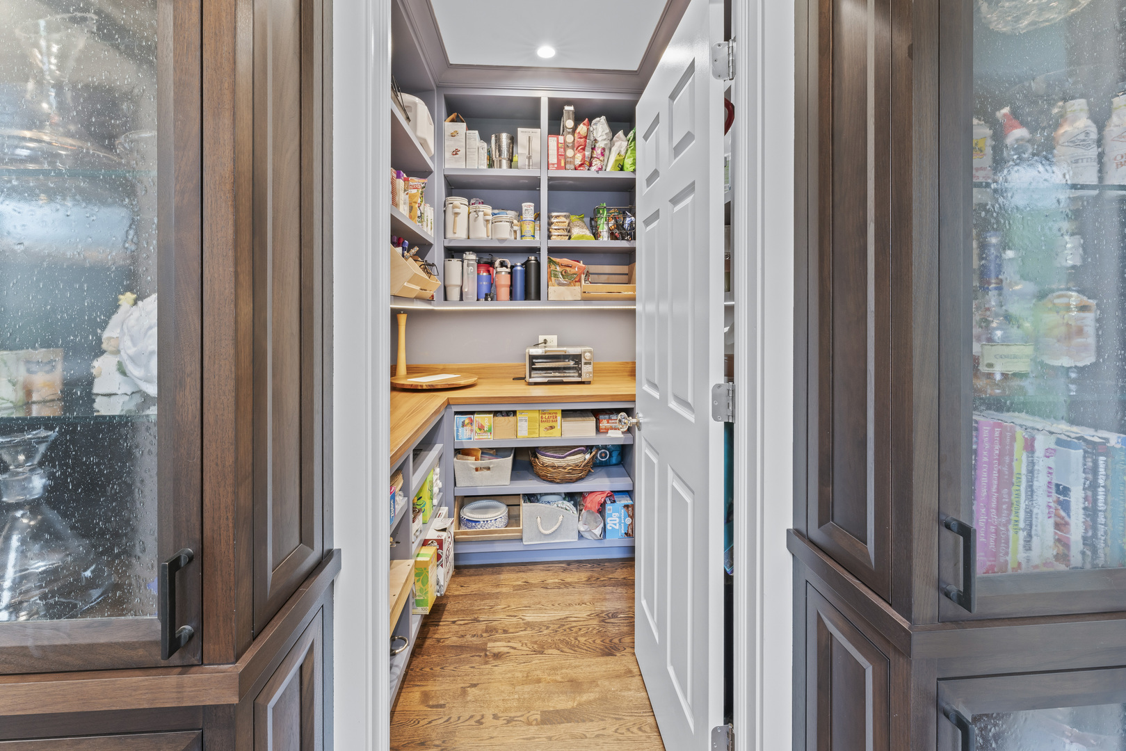 1546 Midway Lane Glenview, IL 60026 - Photo 17 of 46 a view of a hallway with wooden shelves