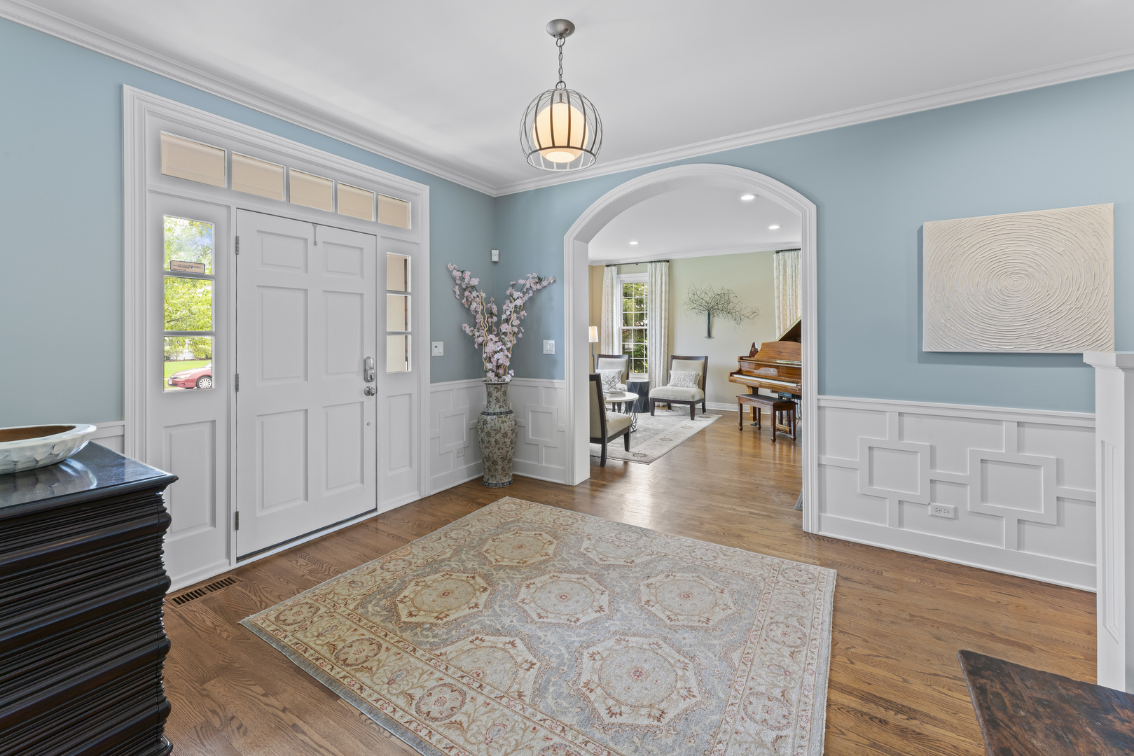 1546 Midway Lane Glenview, IL 60026 - Photo 4 of 46 a view of a livingroom with furniture wooden floor and windows