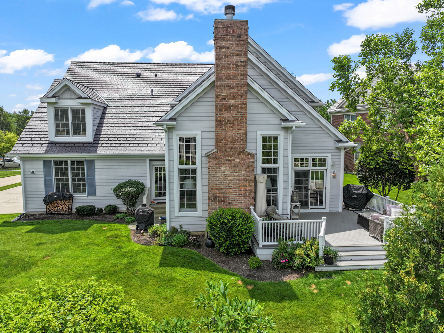 1546 Midway Lane Glenview, IL 60026 - Photo 42 of 46 a front view of a house with a yard and porch