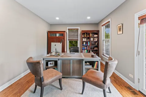 a view of a workspace with furniture