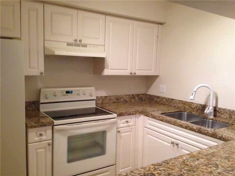 6726 West Sample Road, Unit 6726 Coral Springs, FL 33067 - Photo 1 of 6 Kitchen