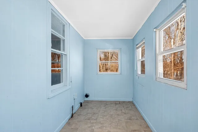 an empty room with windows