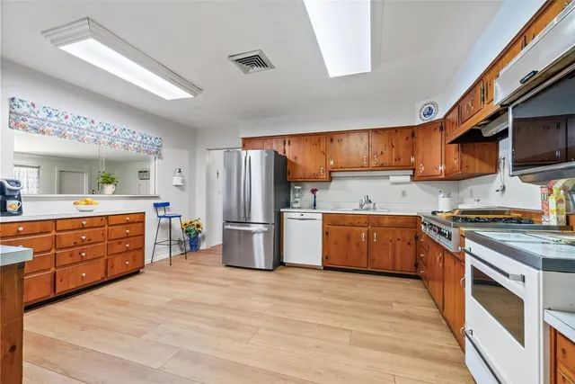 a view of a backyard of the house