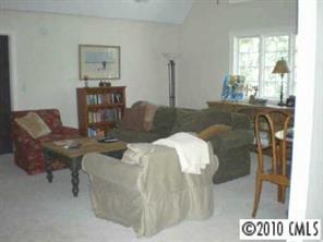 1426 Audubon Road Charlotte, NC 28211 - Photo 6 of 7 a living room with furniture and a large window