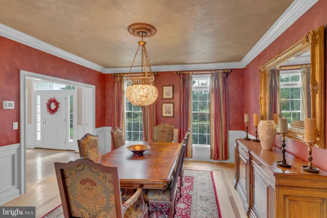 a kitchen with granite countertop a sink and cabinets