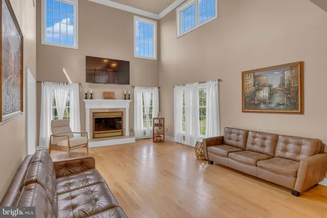 a kitchen with stainless steel appliances granite countertop a stove and cabinets
