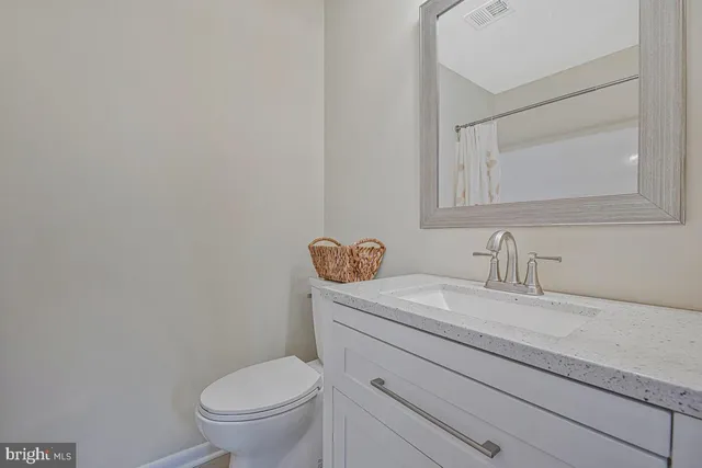 a bedroom with a bed and a shower