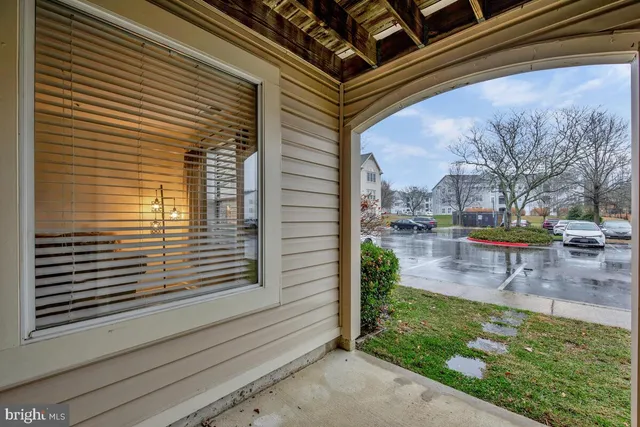 a view of a door and a window