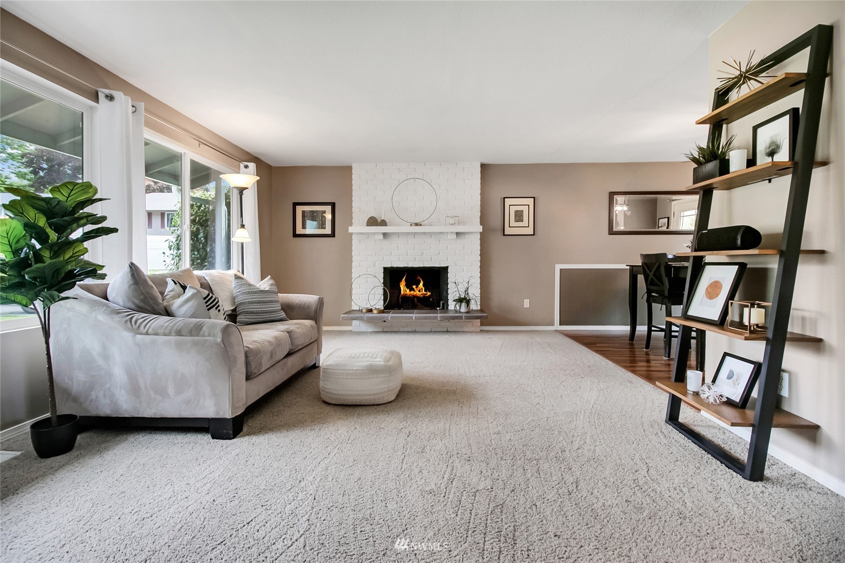 11811 Northeast 158th Street Bothell, WA 98011 - Photo 8 of 38 a living room with furniture and a fireplace