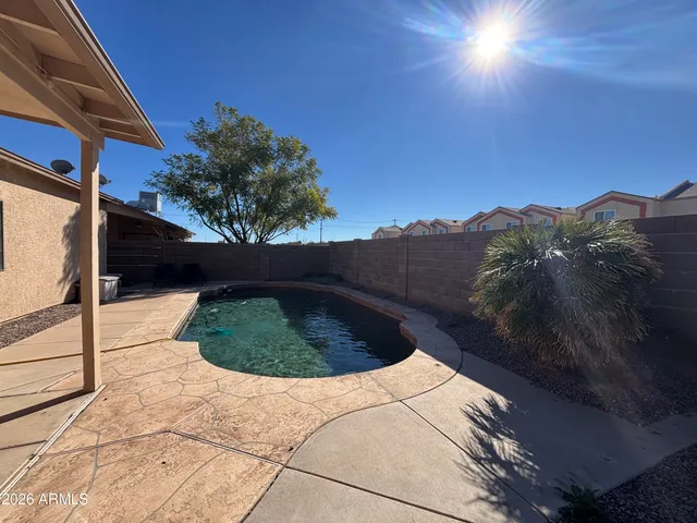 a view of outdoor space and backyard