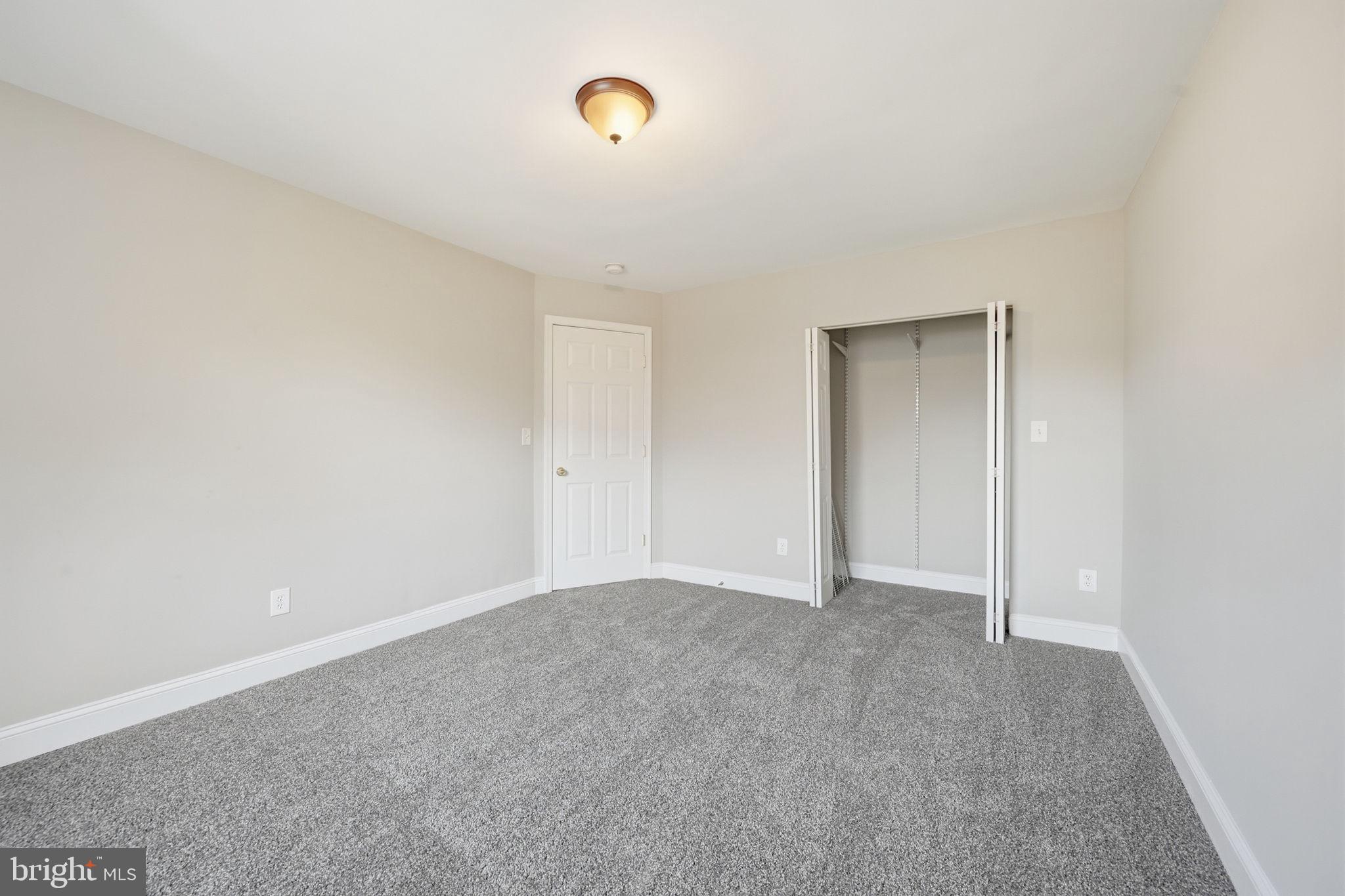 3723 Yolando Road Baltimore, MD 21218 - Photo 27 of 42 a view of an empty room and chandelier fan