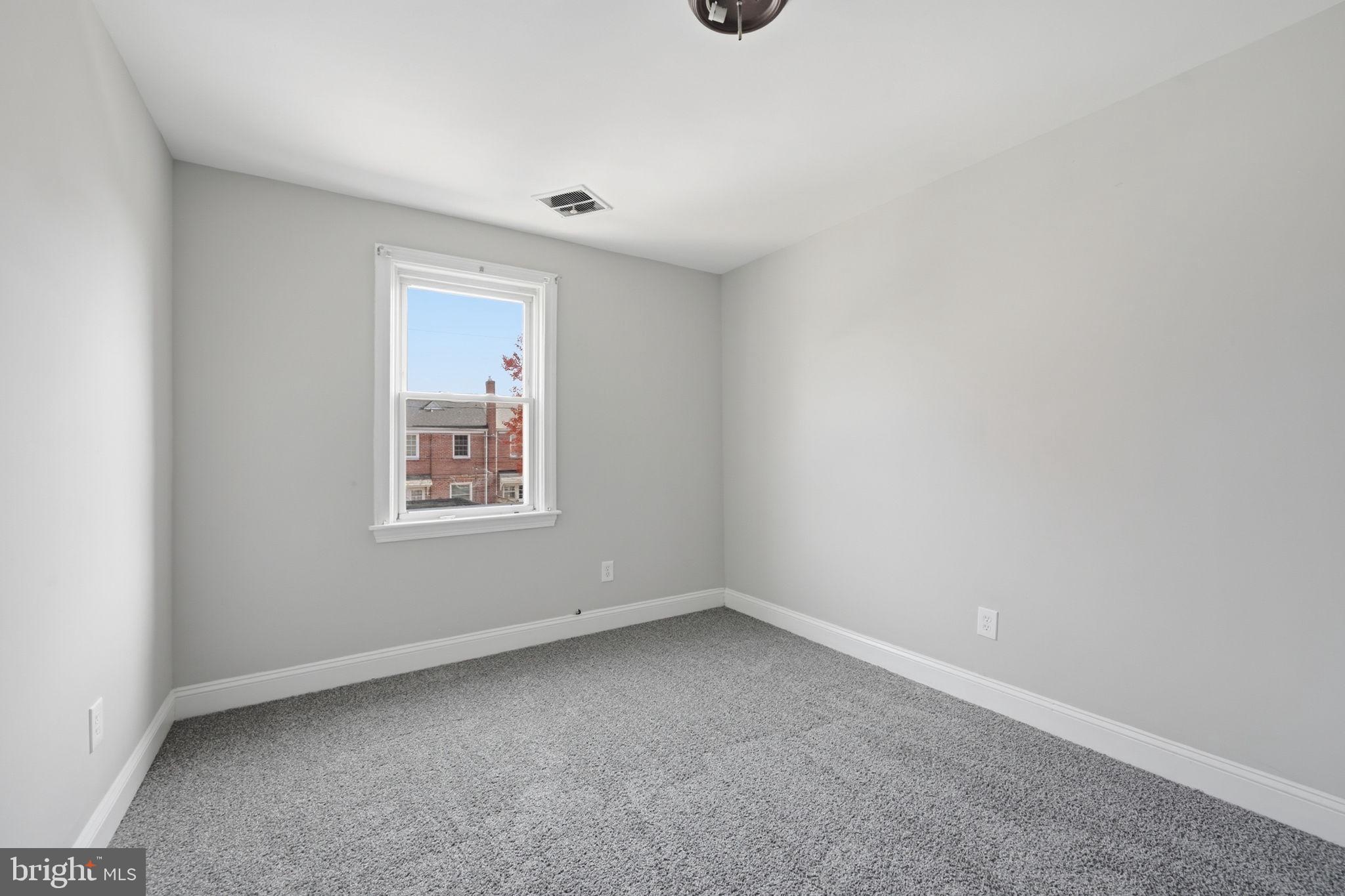 3723 Yolando Road Baltimore, MD 21218 - Photo 31 of 42 an empty room with a window