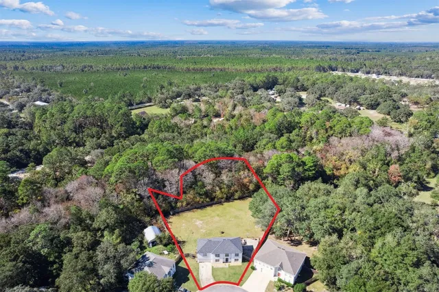 a view of a lake with a house