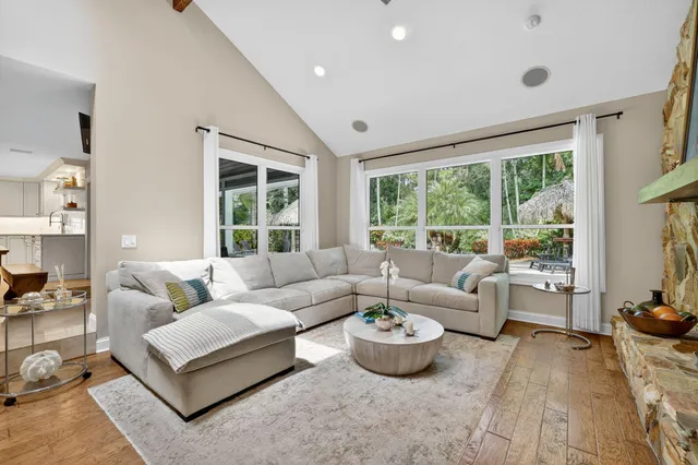 a bed room with furniture and a window