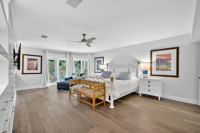 a bedroom with a bed and dresser