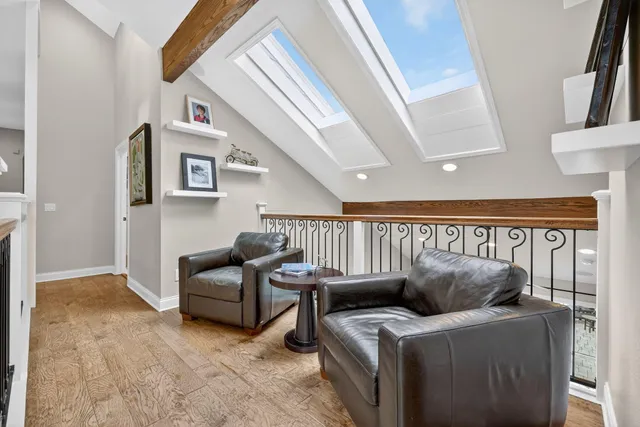 a backyard of a house with yard and outdoor seating