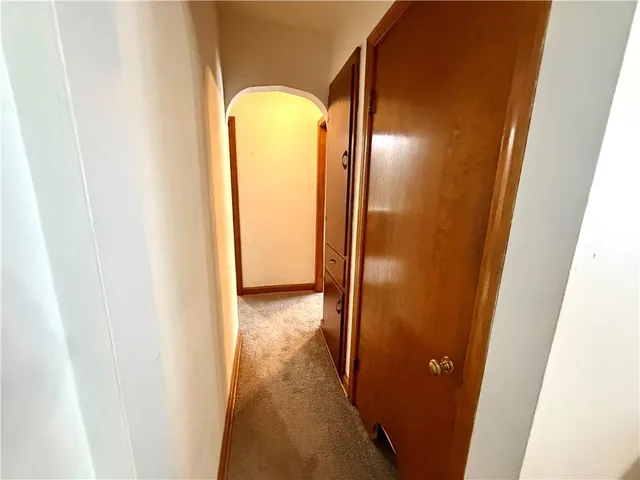 a view of a bathroom with a glass door