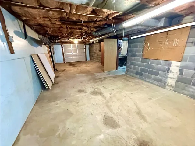 a kitchen with stainless steel appliances a refrigerator and a stove