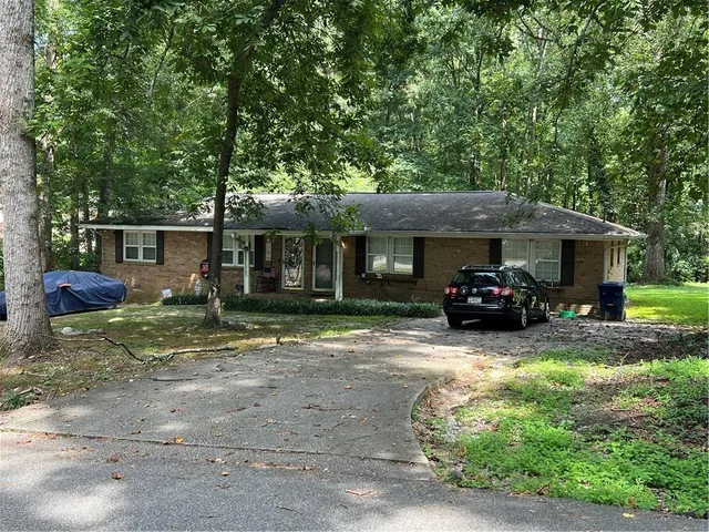 a view of house with outdoor space