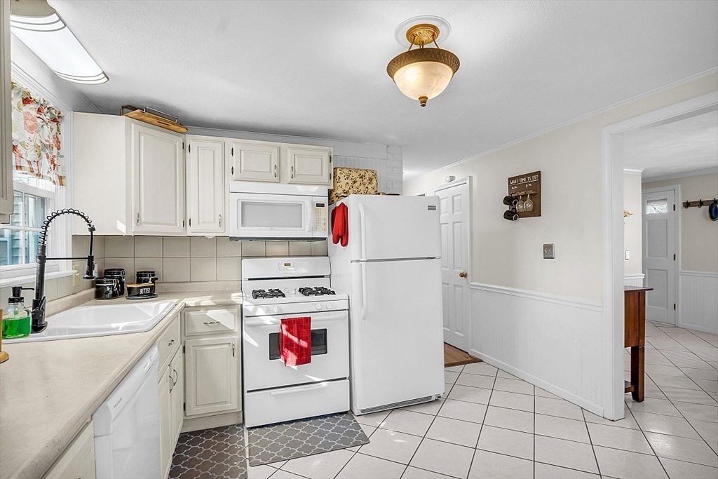 24 Edward Road Townsend, MA 01469 - Photo 15 of 38 a kitchen with a cabinets and white appliances