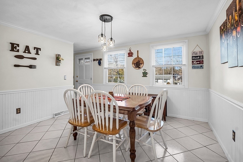 24 Edward Road Townsend, MA 01469 - Photo 20 of 38 a view of a dining room with furniture and chandelier