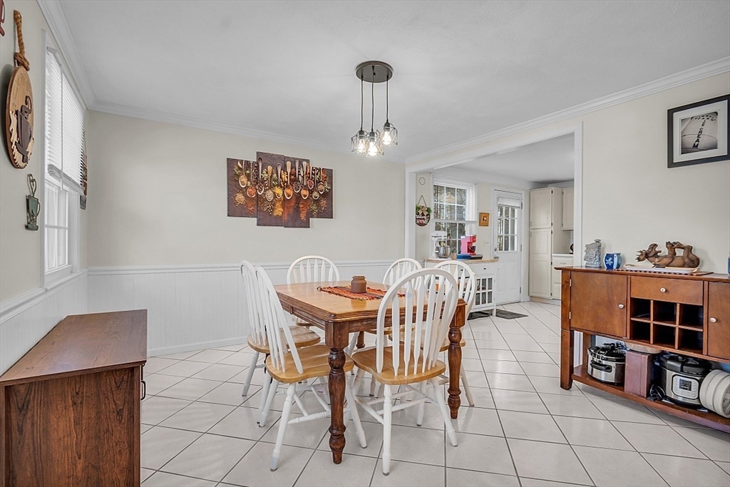 24 Edward Road Townsend, MA 01469 - Photo 21 of 38 a view of a dining room with furniture and chandelier