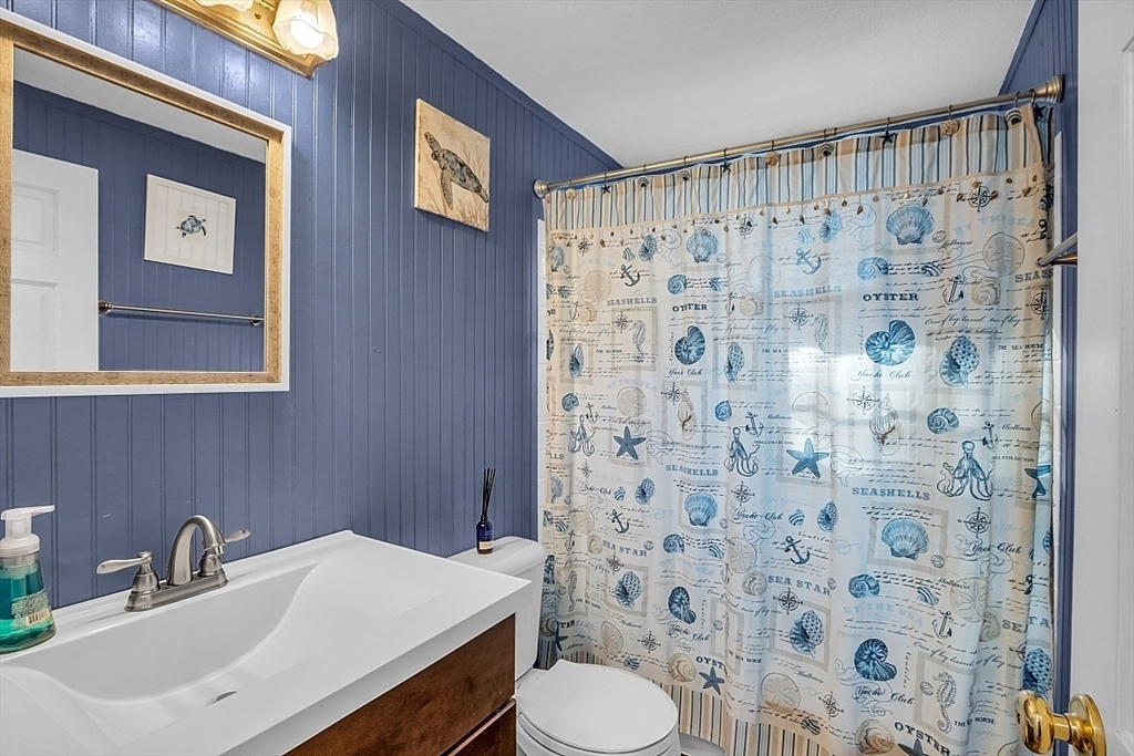24 Edward Road Townsend, MA 01469 - Photo 25 of 38 a bathroom with a sink toilet and shower