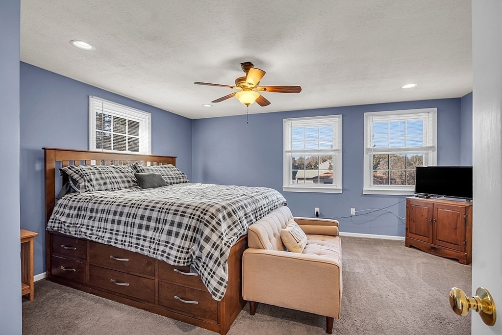 24 Edward Road Townsend, MA 01469 - Photo 27 of 38 a bedroom with a bed and furniture