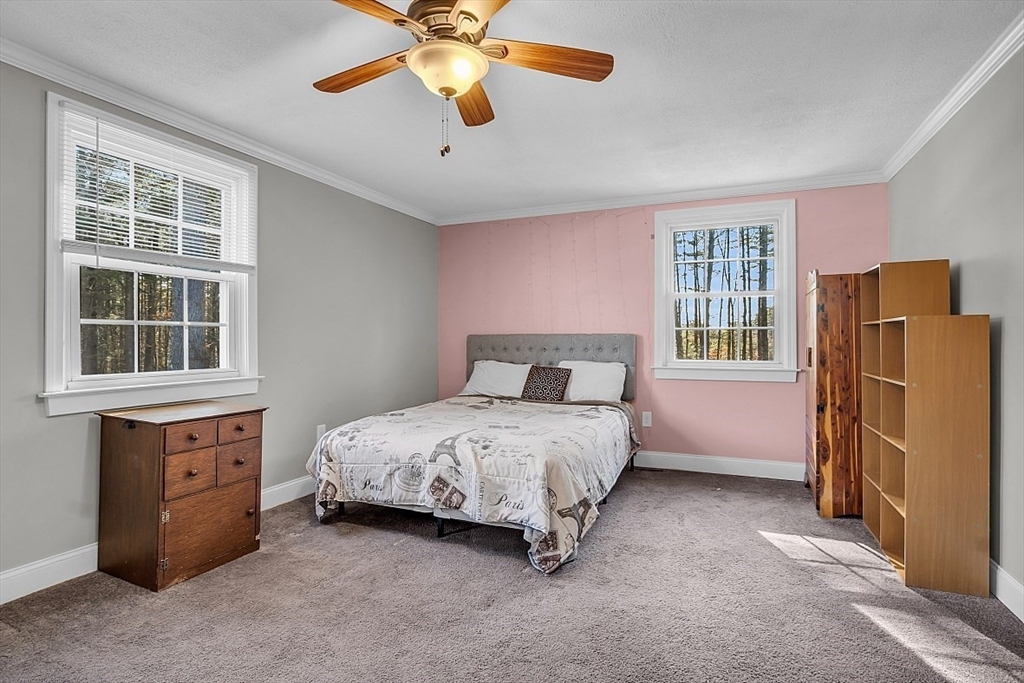 24 Edward Road Townsend, MA 01469 - Photo 32 of 38 a spacious bedroom with a bed and a window