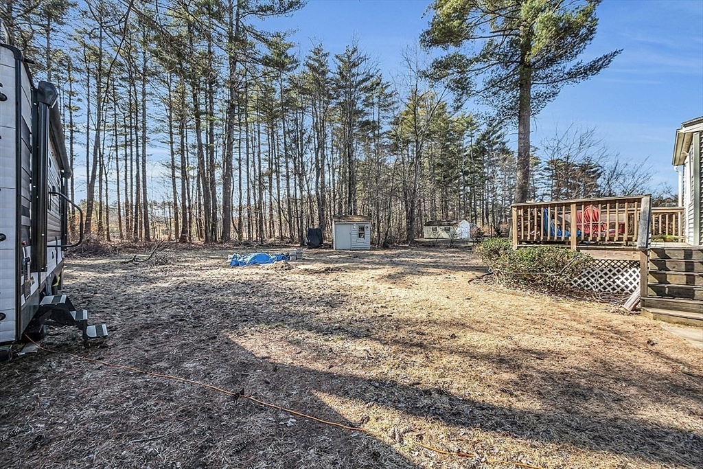 24 Edward Road Townsend, MA 01469 - Photo 38 of 38 a view of outdoor space with deck and trees