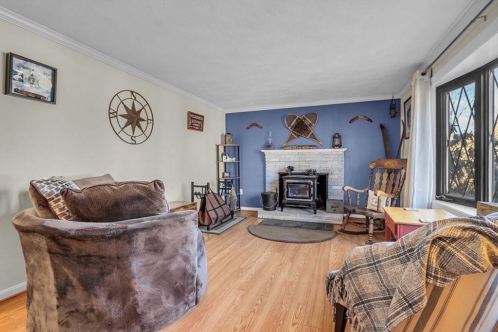 24 Edward Road Townsend, MA 01469 - Photo 6 of 38 a living room with furniture and a fireplace