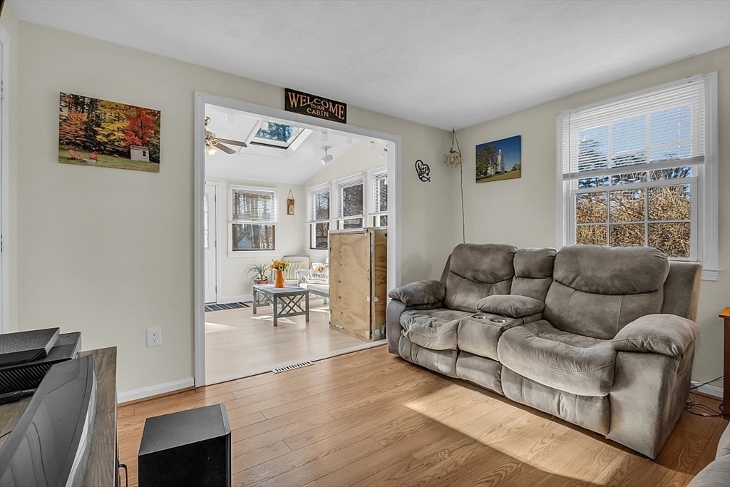 24 Edward Road Townsend, MA 01469 - Photo 8 of 38 a living room with furniture and a large window