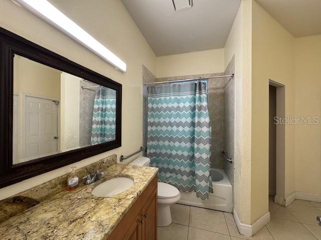 12140 Murray Avenue Largo, FL 33778 - Photo 19 of 23 a bathroom with a granite countertop sink and a mirror