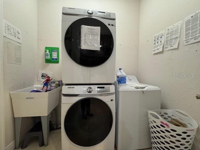 12140 Murray Avenue Largo, FL 33778 - Photo 20 of 23 a utility room with dryer and washer