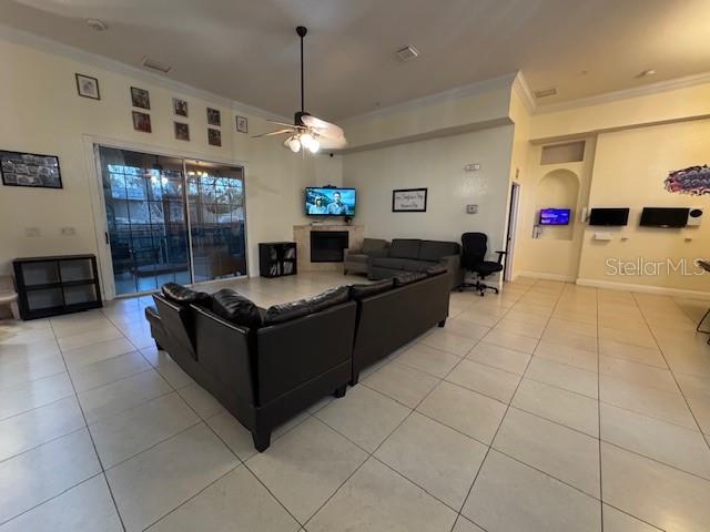 12140 Murray Avenue Largo, FL 33778 - Photo 3 of 23 a living room with furniture and a flat screen tv