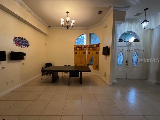 12140 Murray Avenue Largo, FL 33778 - Photo 9 of 23 a view of a livingroom with furniture and chandelier