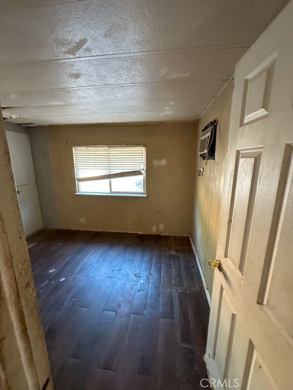 1070 Katherine Road Simi Valley, CA 93063 - Photo 13 of 17 a view of an empty room with wooden floor and window