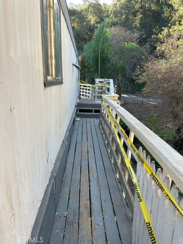 1070 Katherine Road Simi Valley, CA 93063 - Photo 6 of 17 a balcony with wooden floor