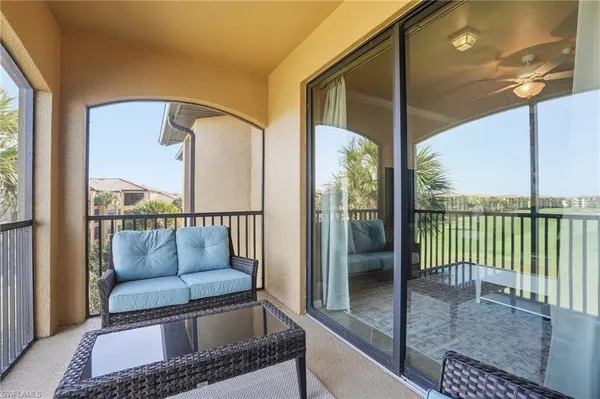 a living room with a couch and a table