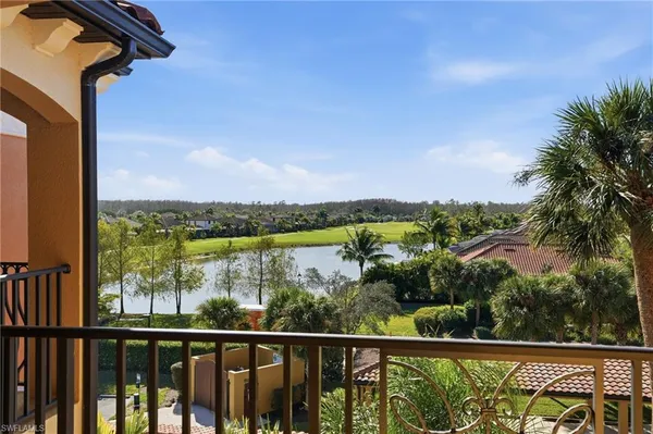a view of a lake from a balcony