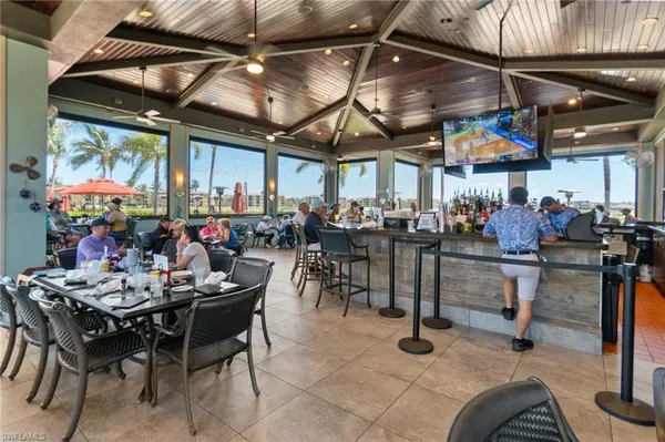 a group of people sitting in a patio
