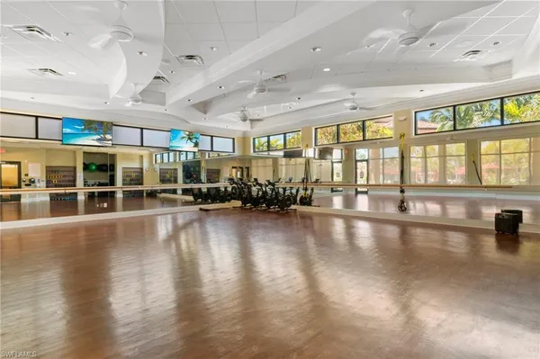 a view of a room with lots of wooden floor